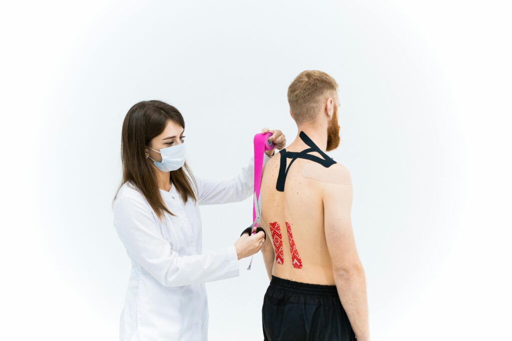 A man in a white lab coat holds a pink stick, symbolizing health and prevention tips for a better lifestyle.
